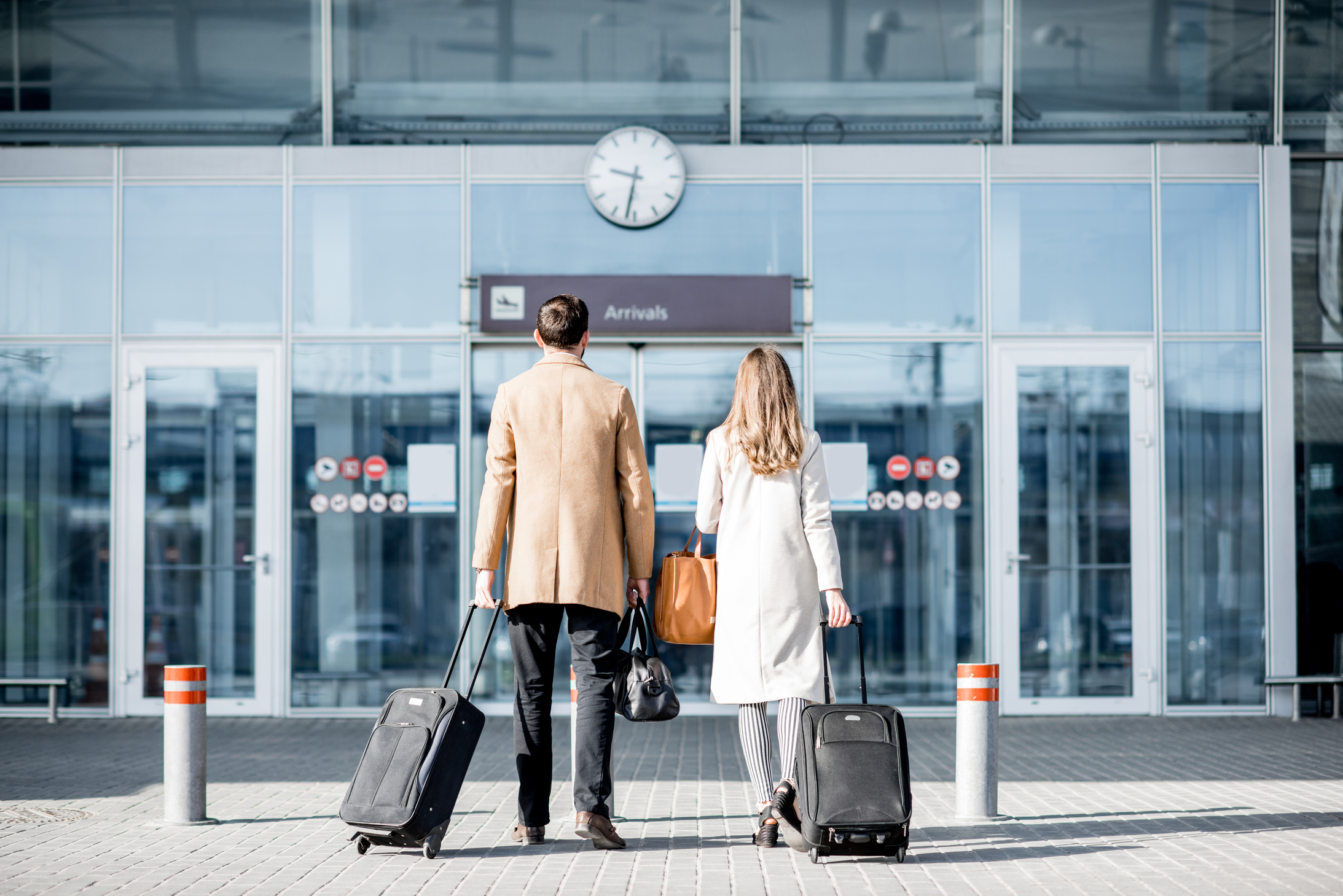 Business Couple Walking to the Airport